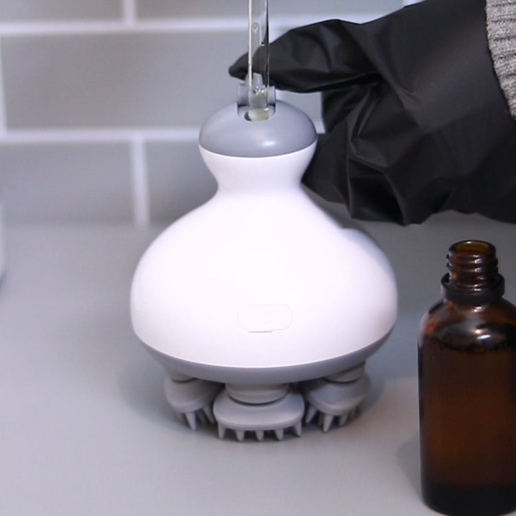 ManiRelax - Masseur de tête avec réservoir d'huile